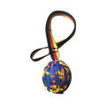 EVA floating knot ball for dog water training in camouflage and yellow colours with tether attachment