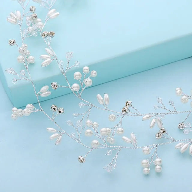 Bride's crystal pearl wedding hair band accessory in silver, gold, and rose gold colours with wired construction