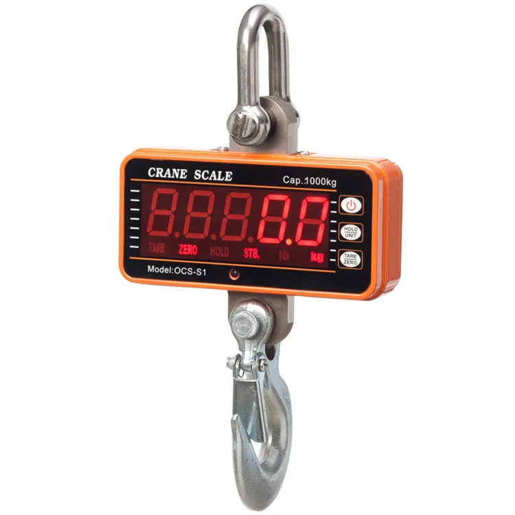 Orange electronic crane scale with digital display, shown suspended for industrial weighing.