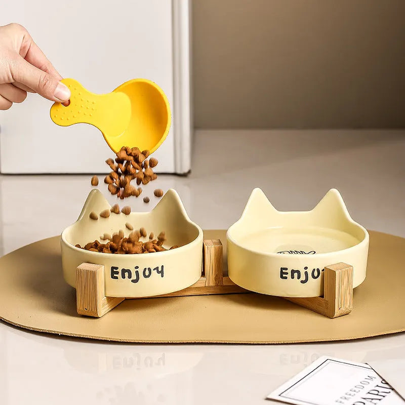Porcelain cat bowl set with wooden frame in cat paw design