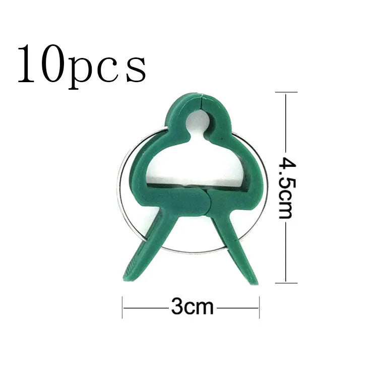 Green plastic and zinc plant fixing clips in large and small sizes for garden vine support.