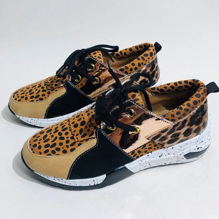 Women's casual sneakers with wedge heel in leopard print, suede upper, and plastic sole