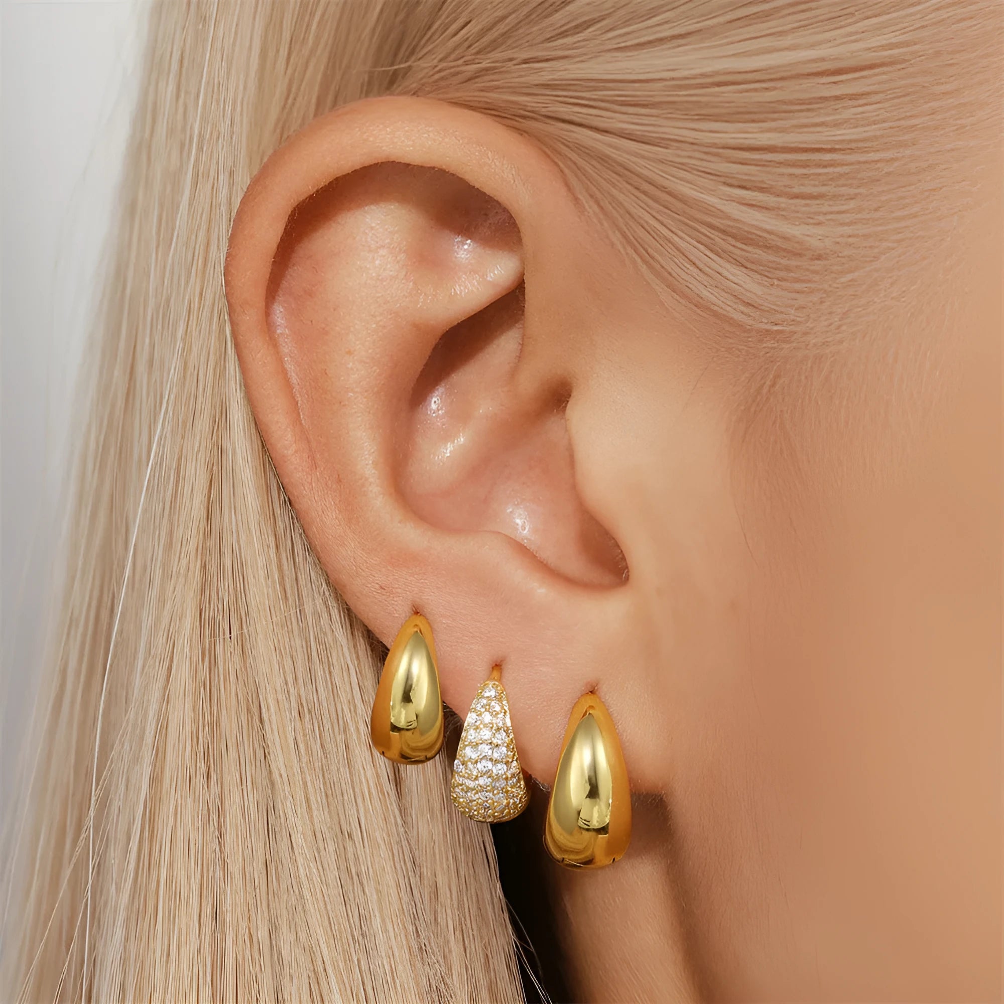 Brass diamond earclip earrings in geometric round design with golden electroplated finish