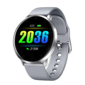 Ultra-thin smart health bracelet in silver with a zinc alloy case and a black silicone wrist strap.