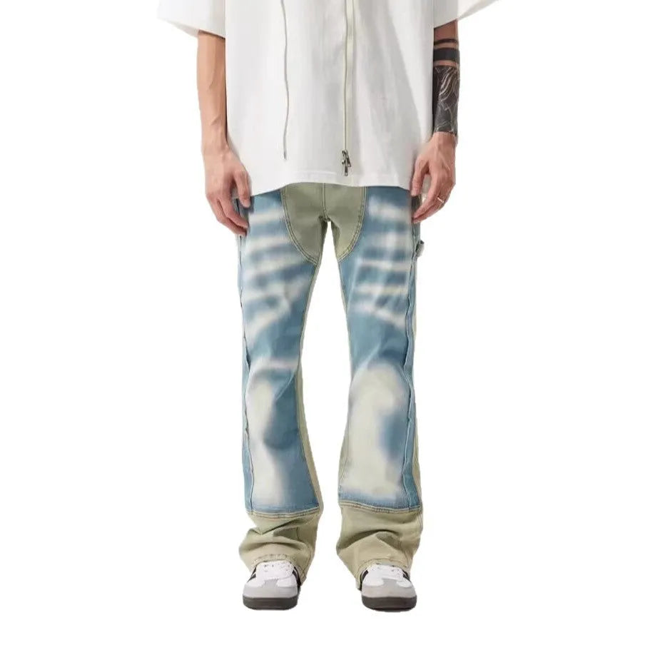 Yellow and blue retro patchwork jeans with splash-ink damaged design on denim