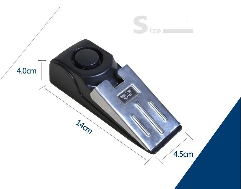 Black portable wedge-shaped door stop alarm with a stainless steel cover for home and travel security.