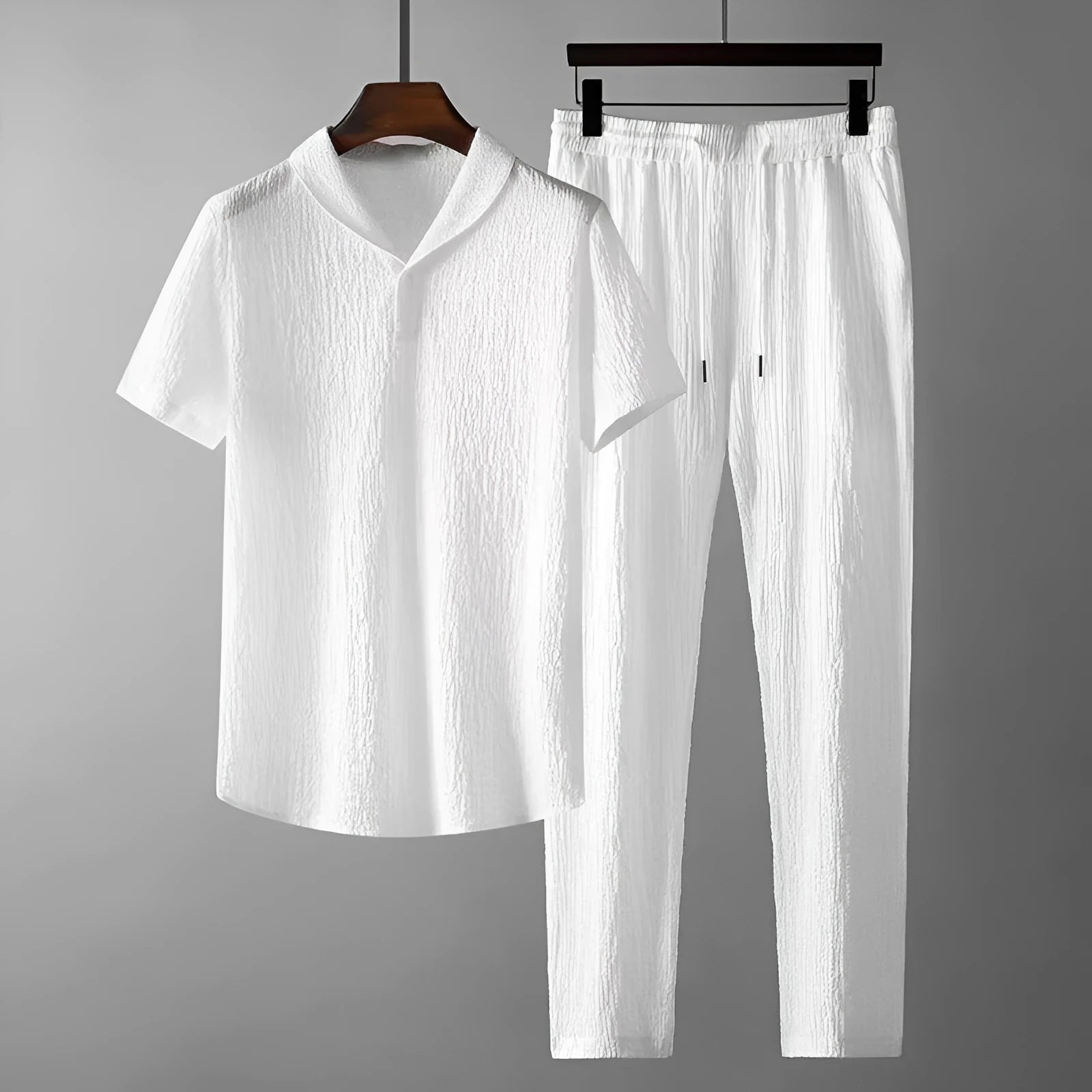 Men's leisure suit with short sleeve top and drawstring trousers in black and white, polyester fabric, loose fit