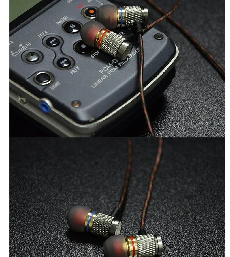 Black wired in-ear headphones with 3.5mm L-bend plug, silicone cable, and TPE earplugs.