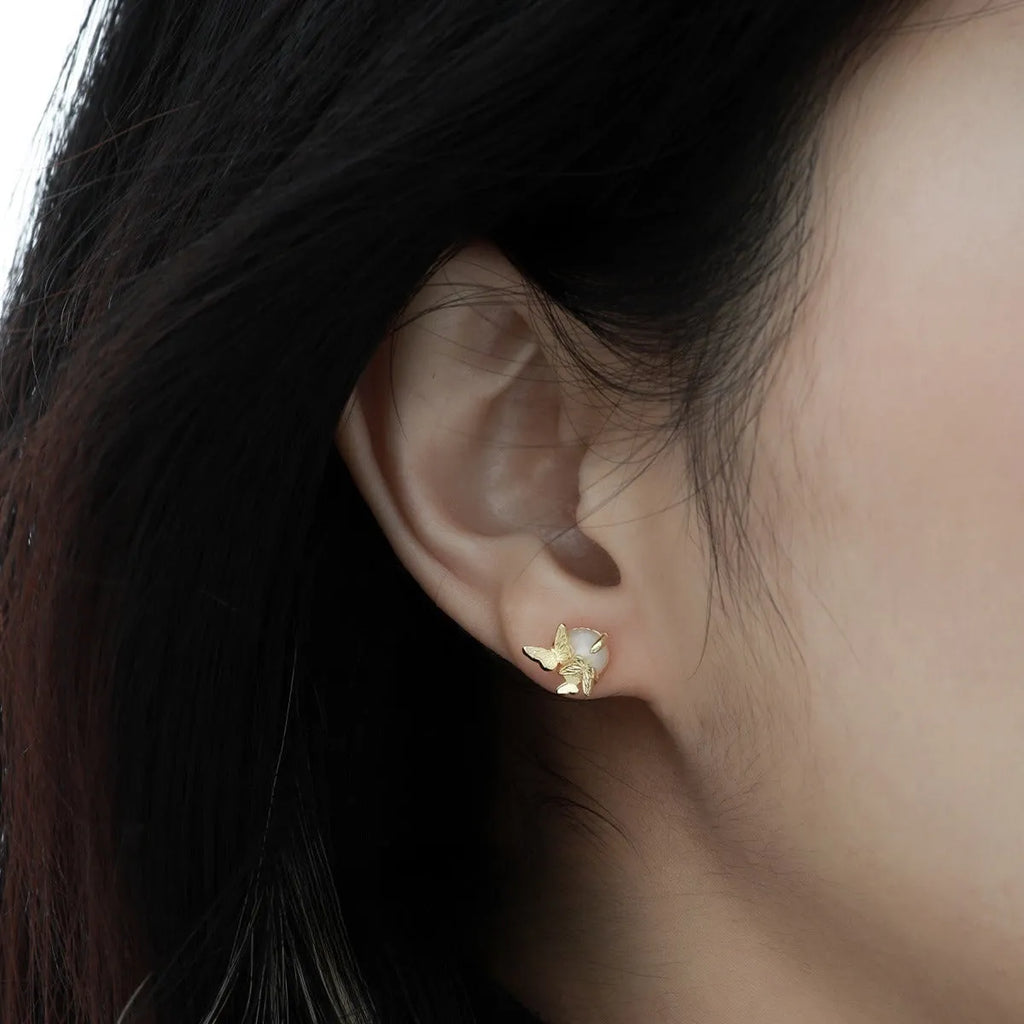 925 silver butterfly ear studs with electroplated finish in white gold or gold colour options