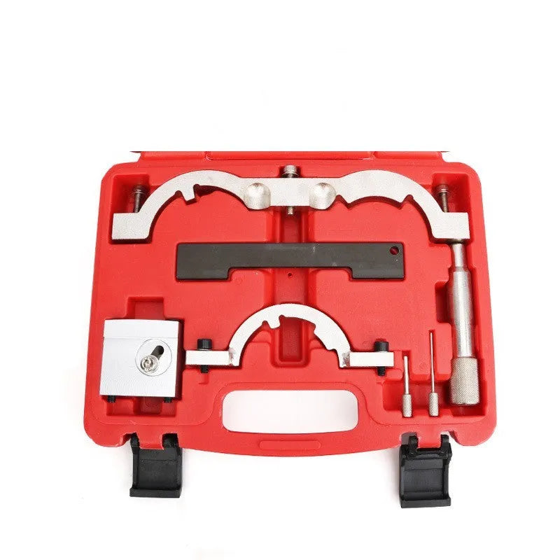 Red timing tool kit for Opel 1.4T LUJ engine with seven chrome-vanadium steel tools on a workbench.