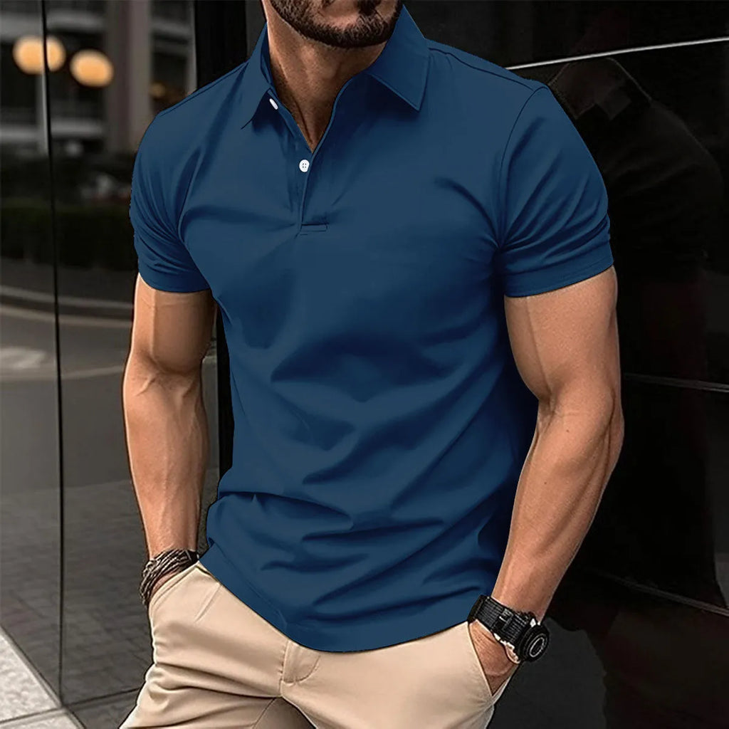 Man wearing a solid colour short sleeve polo shirt with a button lapel collar for summer casual wear.