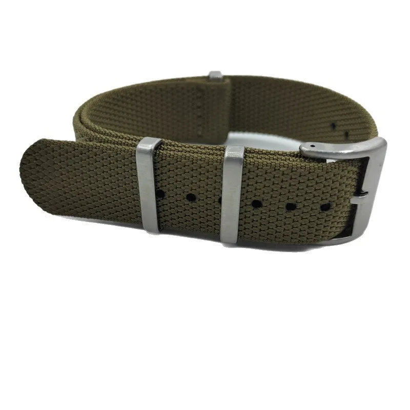 Nylon integrated watch strap in military colours showing integrated design without separate buckles