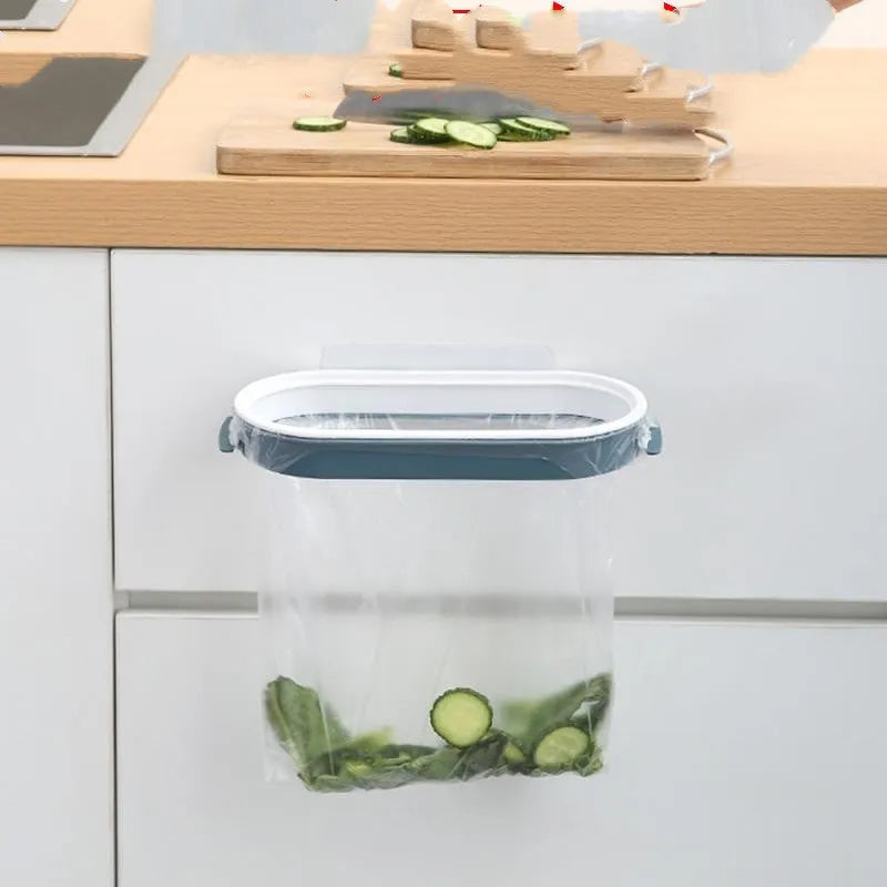 Blue plastic T-shaped garbage bag storage rack on a kitchen counter.
