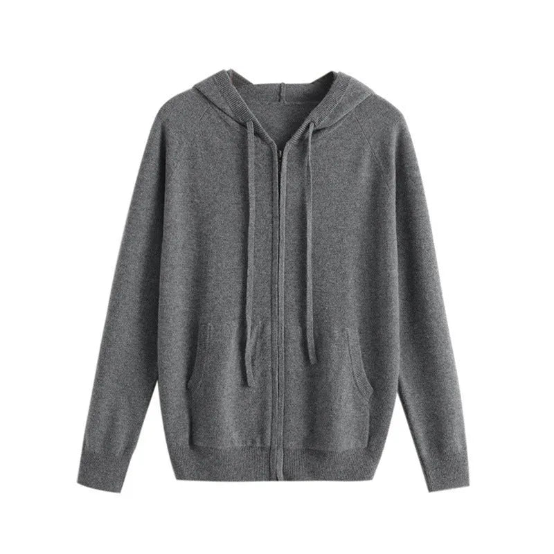Man wearing a solid-colour hooded zip-up knitted cardigan in a business casual setting.