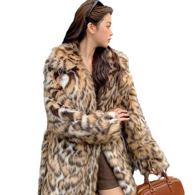 Long faux fur coat with fur collar and pockets in street fashion style
