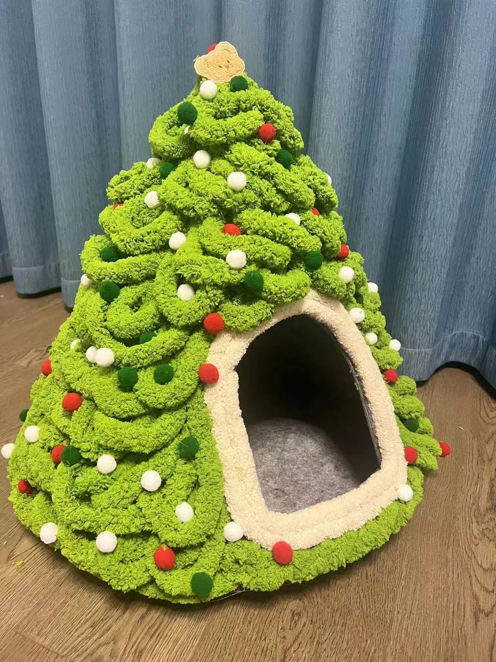 Grey conical felt cat house tent with circular base for indoor use