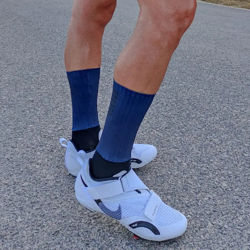Cycling socks with moisture management fabric in six colour options for athletic use