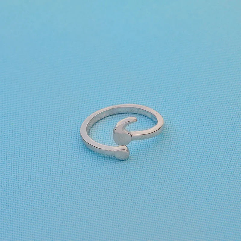 Women's silver-tone alloy ring available in sizes 5 to 10, simple band design