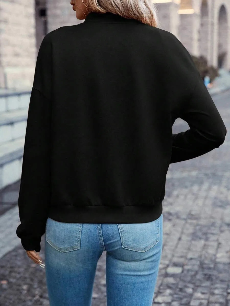 Black women's long sleeve zip jacket with faux pockets for casual autumn winter wear.