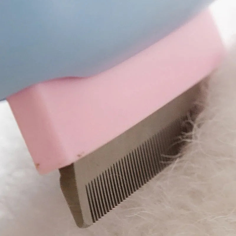 Blue and green dual-sided pet grooming brush with a deshedding rake and dematting comb.