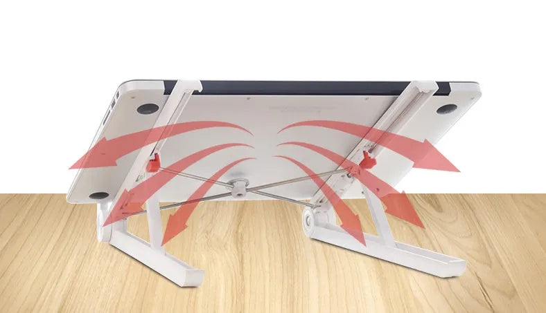 White Whale Race laptop bracket with desktop elevation and integrated heat sink base on desk