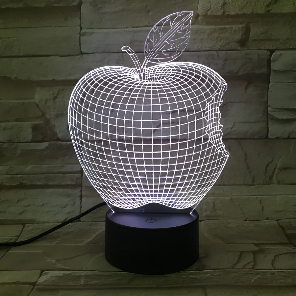 3D fruit-shaped colourful night light with acrylic shade and touch control on a surface.