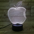 3D fruit-shaped colourful night light with acrylic shade and touch control on a surface.