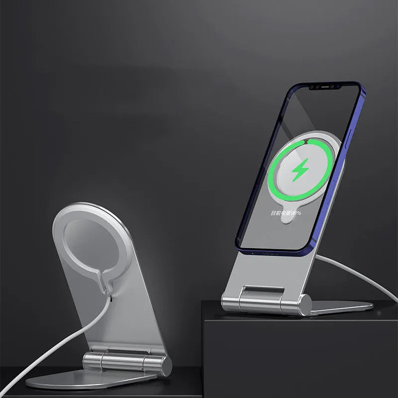 Silver vertical adjustable magnetic phone bracket for iPhone 12 shown in a car and on a desk.