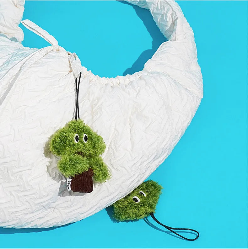 Pine tree shaped fabric cat mint toy with dangling tease stick in three size options