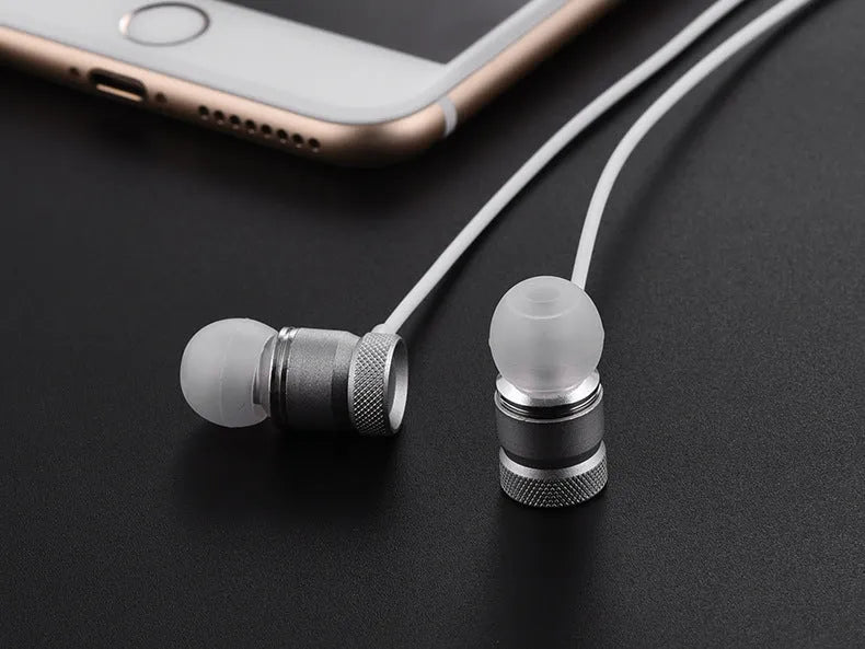 In-ear headphones with TPE cable in four colour options: black, gold, pink, and silver