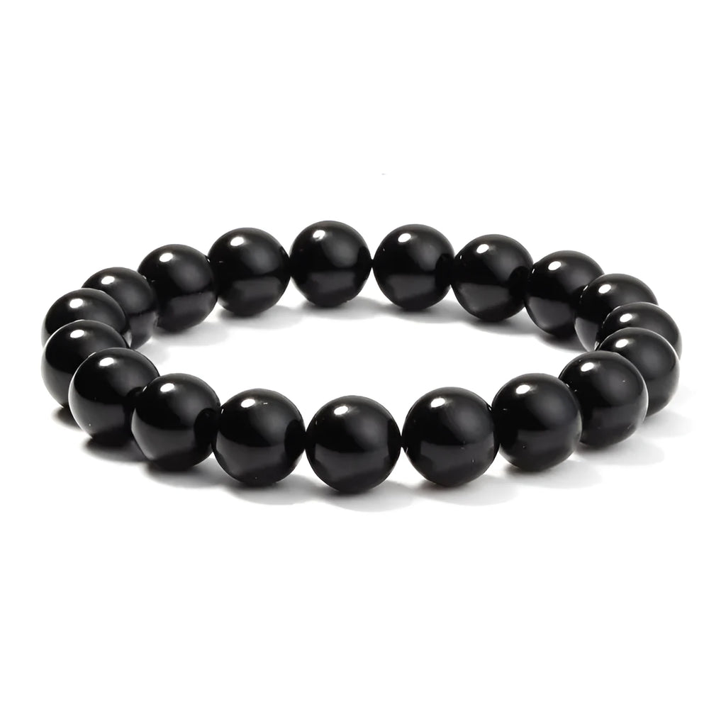 Geometric black agate bead bracelet with elastic cord, showing 8mm bead size detail.