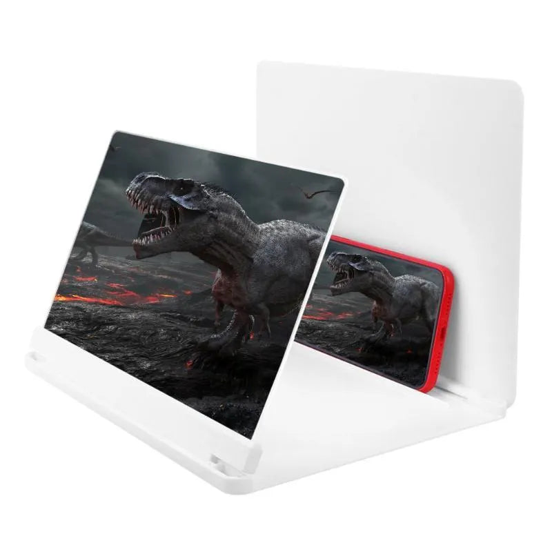 White and black smartphone screen magnifier with integrated phone holder on a table.