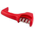 Manual knife sharpener in black with three-stage slots and rubber feet, shown with a kitchen knife.