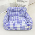 Grey and blue plaid cloth dog car travel nest shown on a car seat, with small and large size options.