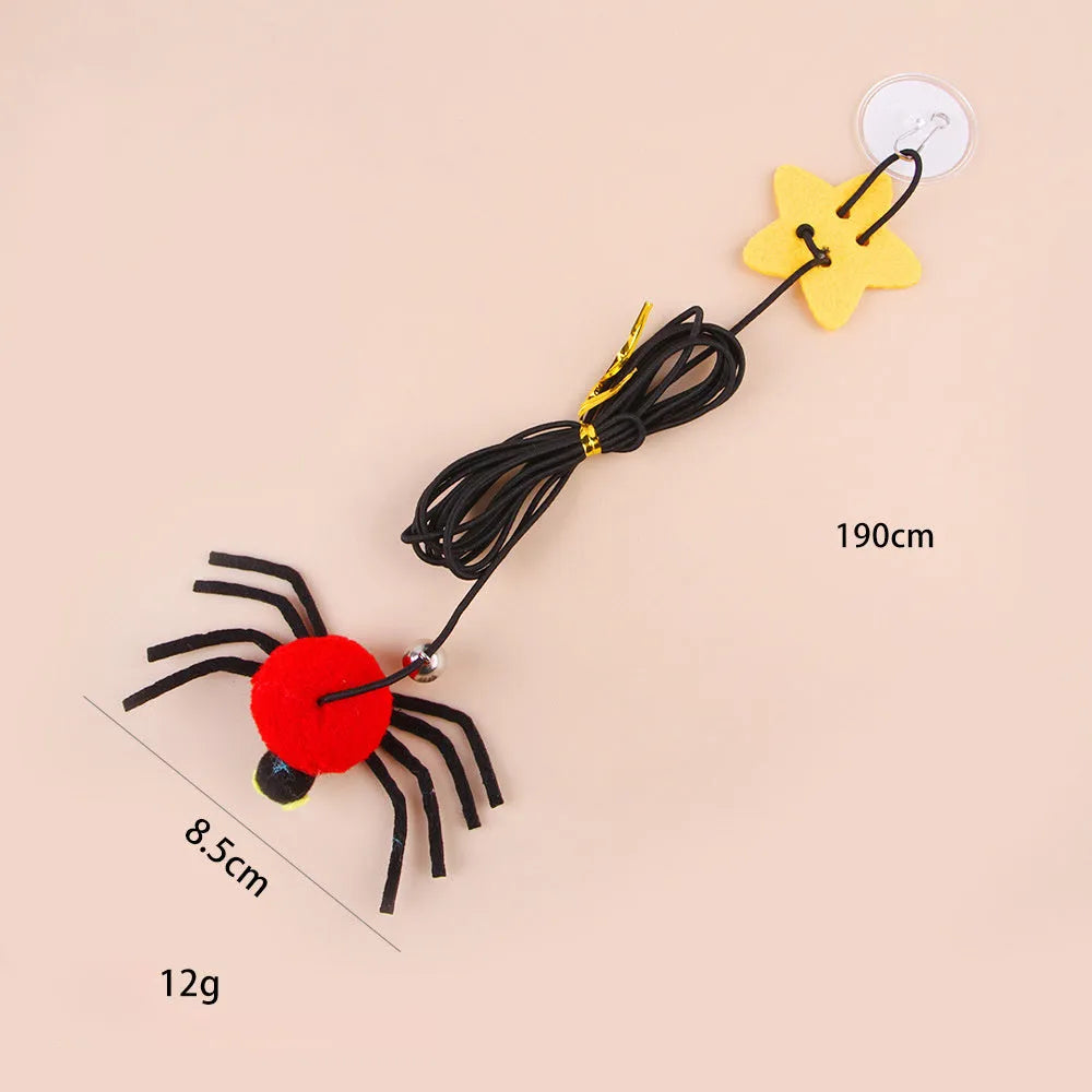 Red or yellow elastic rope cat toy with feather stick and fabric spider bell hanging from a door