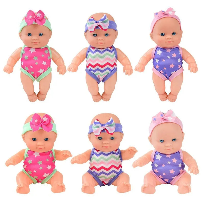 21.5 cm tall simulation baby vinyl doll figurine on display.
