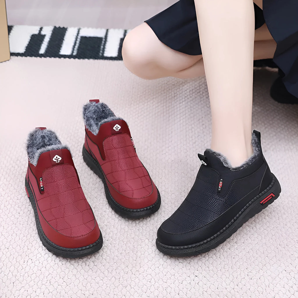 Women's black casual flat boots with round toe and non-slip rubber sole