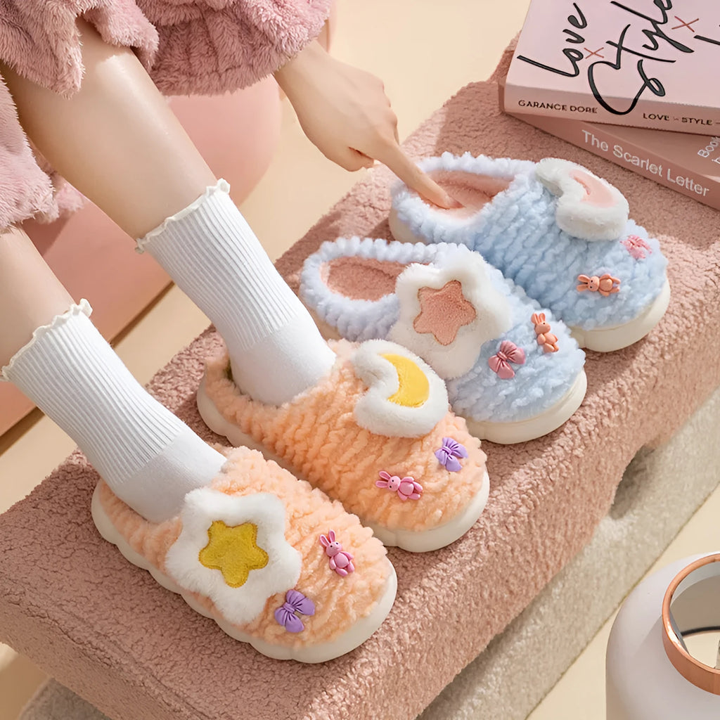 Light blue cartoon animal pattern women's fleece-lined slippers with round toe and PVC sole.