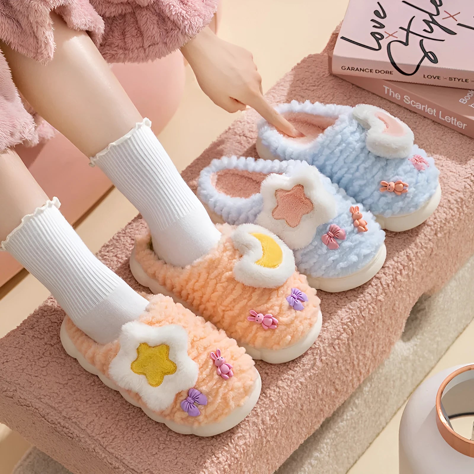Light blue cartoon animal pattern women's fleece-lined slippers with round toe and PVC sole.