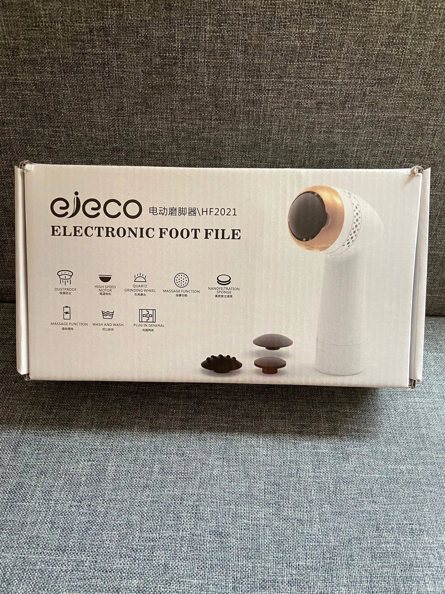 Electric vacuum foot grinder with natural quartz grinding head in gold colour.