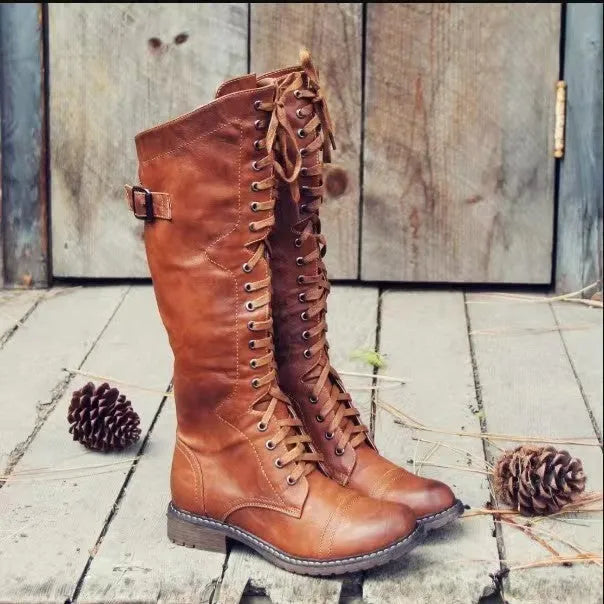 Women's black chunky heel lace-up ankle boots on a white background