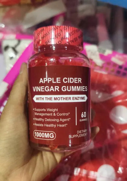 Bottle of apple cider vinegar gummy supplements containing 60 tablets for adult nutritional support