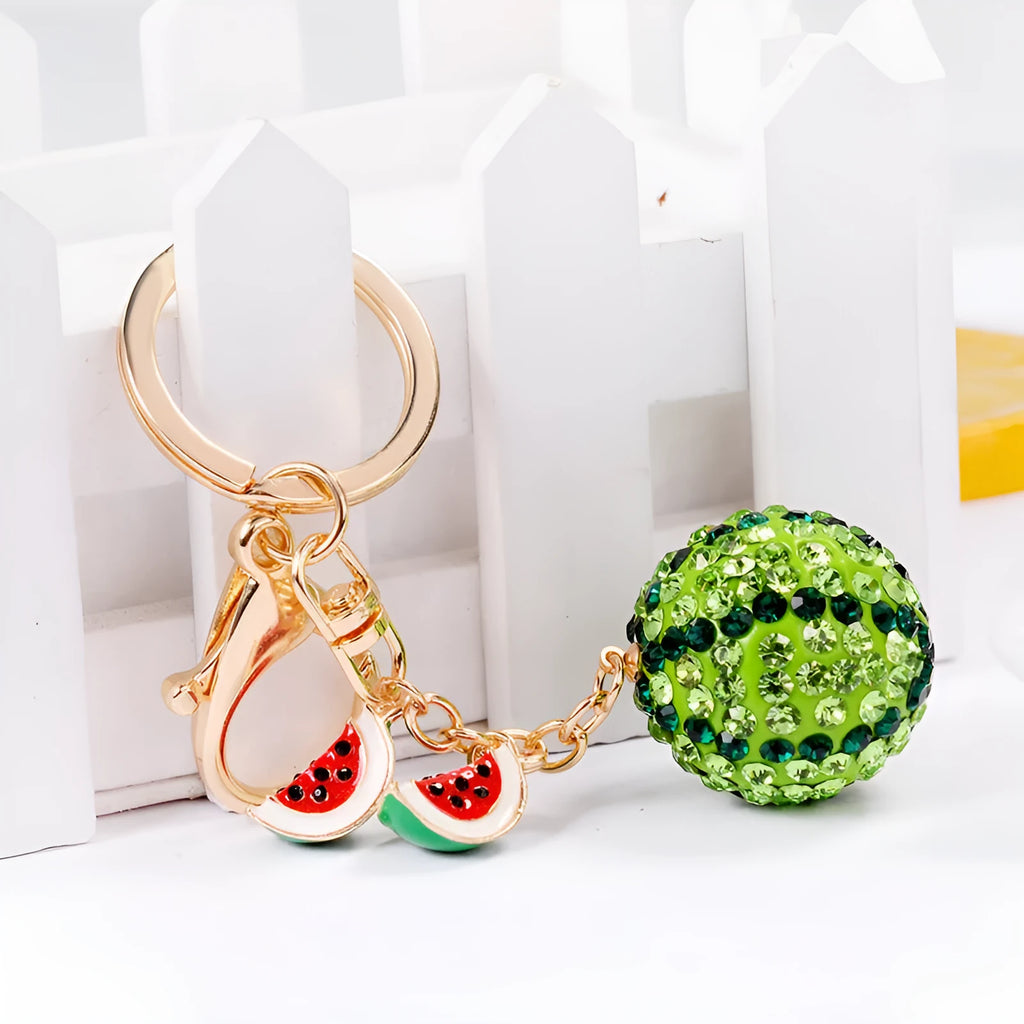 Green zinc alloy watermelon keychain with diamond pattern measuring 12 cm
