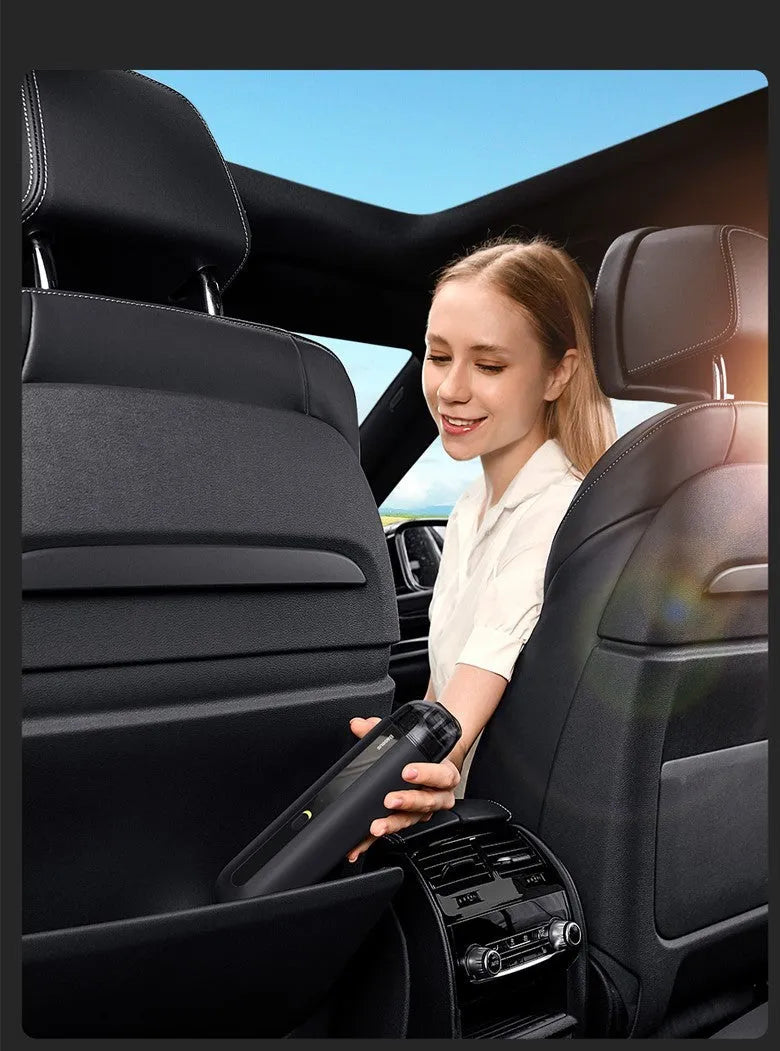 Black handheld wireless car vacuum cleaner with dust bin and blower hose