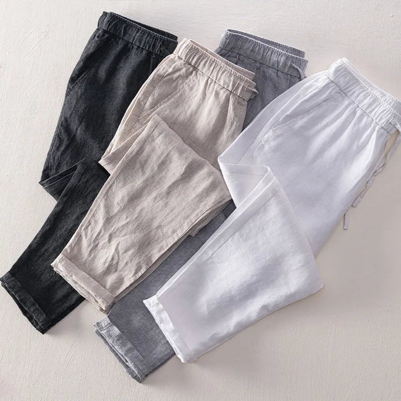 Men's linen straight leg trousers in mid waist design showing white, khaki, light grey and dark grey colour options