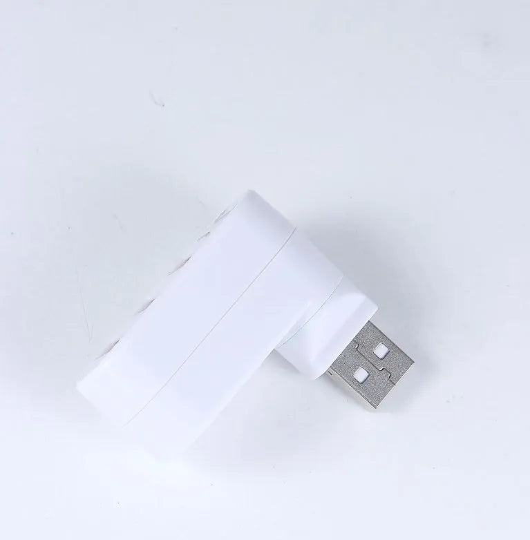 Black and white USB 2.0 hub with 4 ports and spinning colour design element