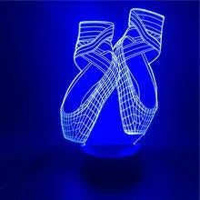 3D ballet dancer silhouette LED night light with remote control on a bedside table