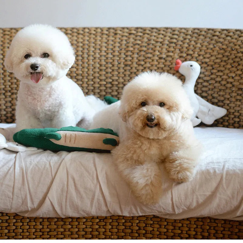 Green plush toy dog measuring 35cm tall by 18cm wide on white background