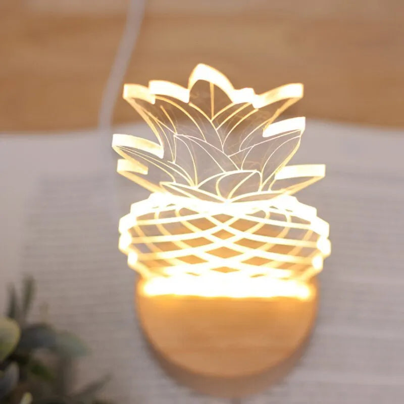 Cartoon pineapple shaped table lamp with wood and acrylic construction on a white background.