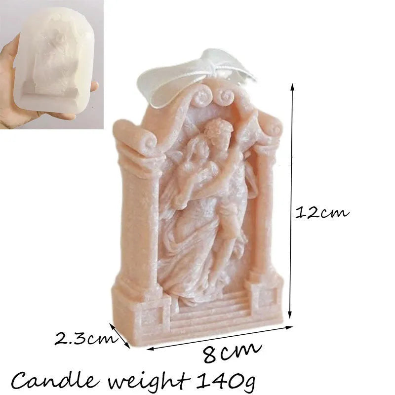 Food-grade silicone mould showing detailed Ancient Greek couple angel design for baking and crafts.